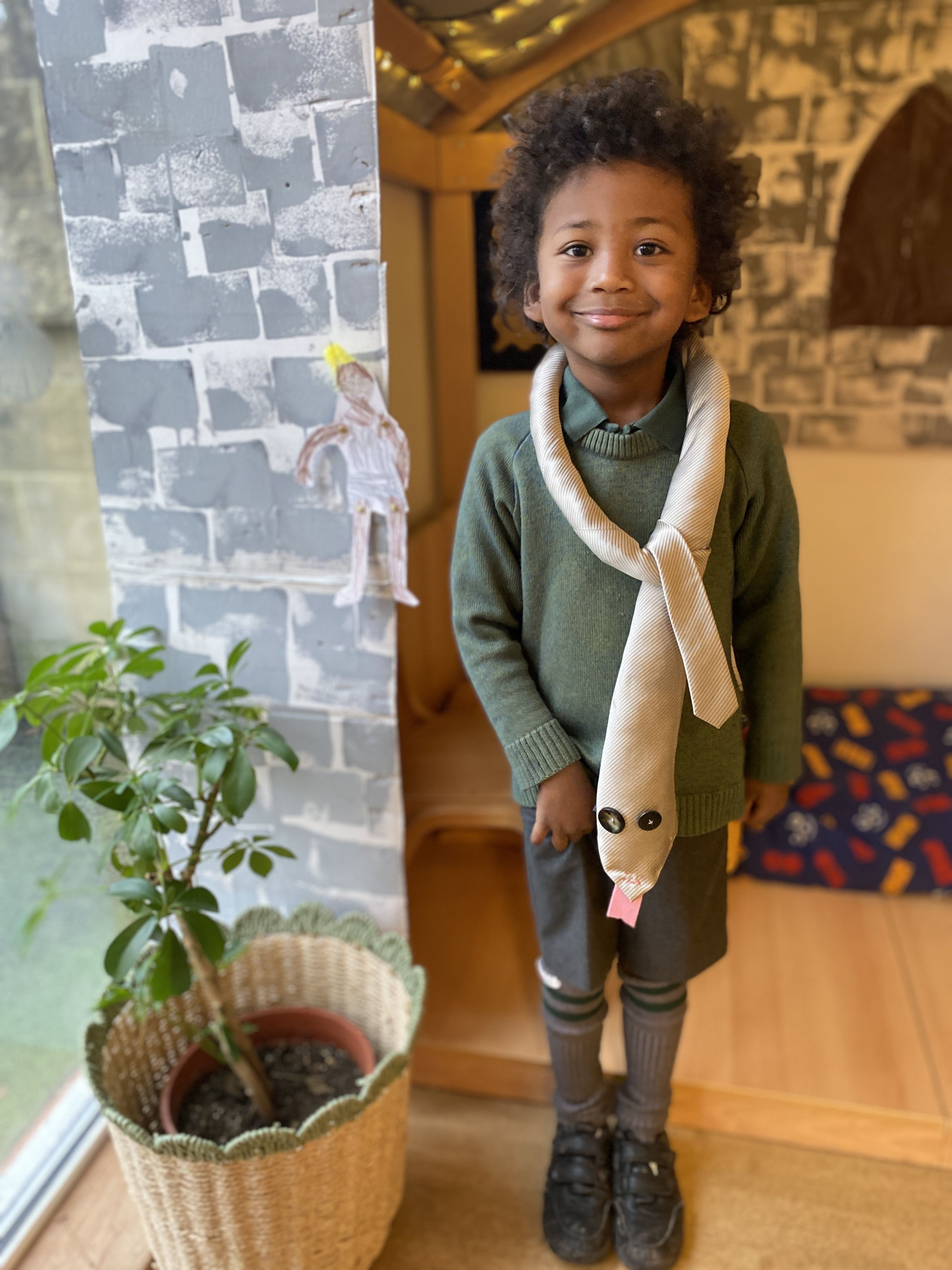 boy with homemade snake