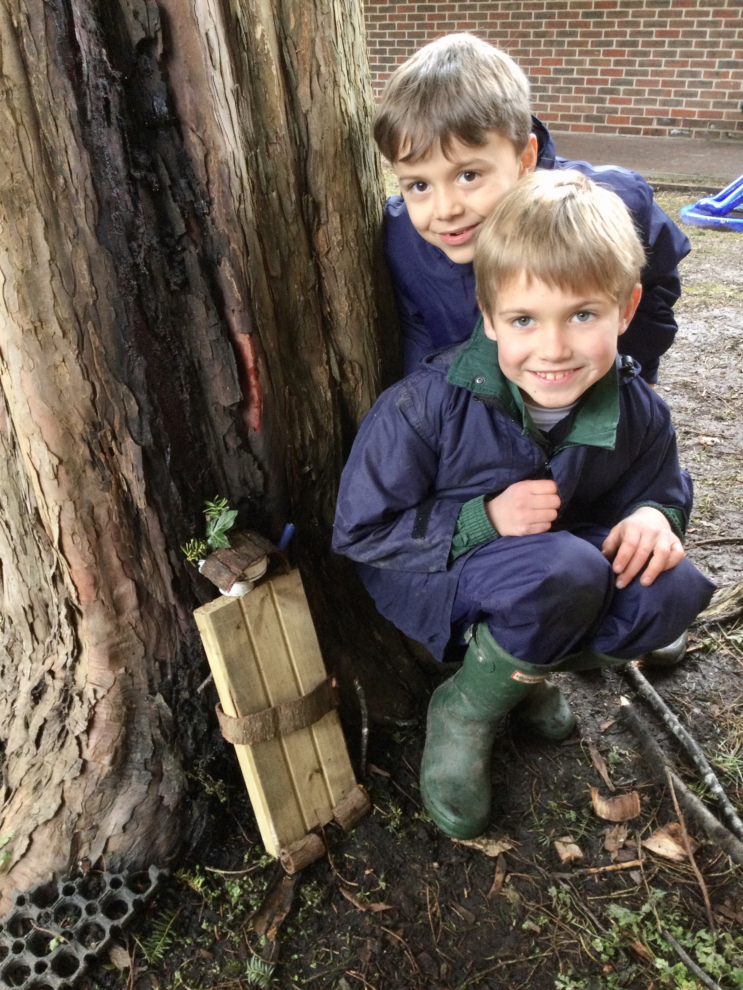 boys creating image of Mother Nature