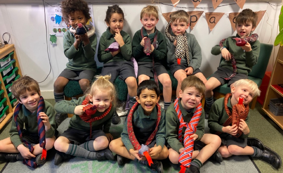 Group of Y1 boys with their homemade snakes